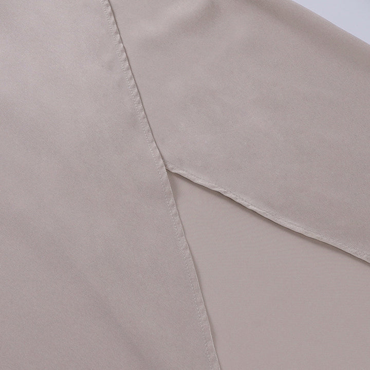 "Robe asymétrique élégante Andrea en noir, ourlet moderne, tissu somptueux pour occasions formelles, tailles S-3XL."