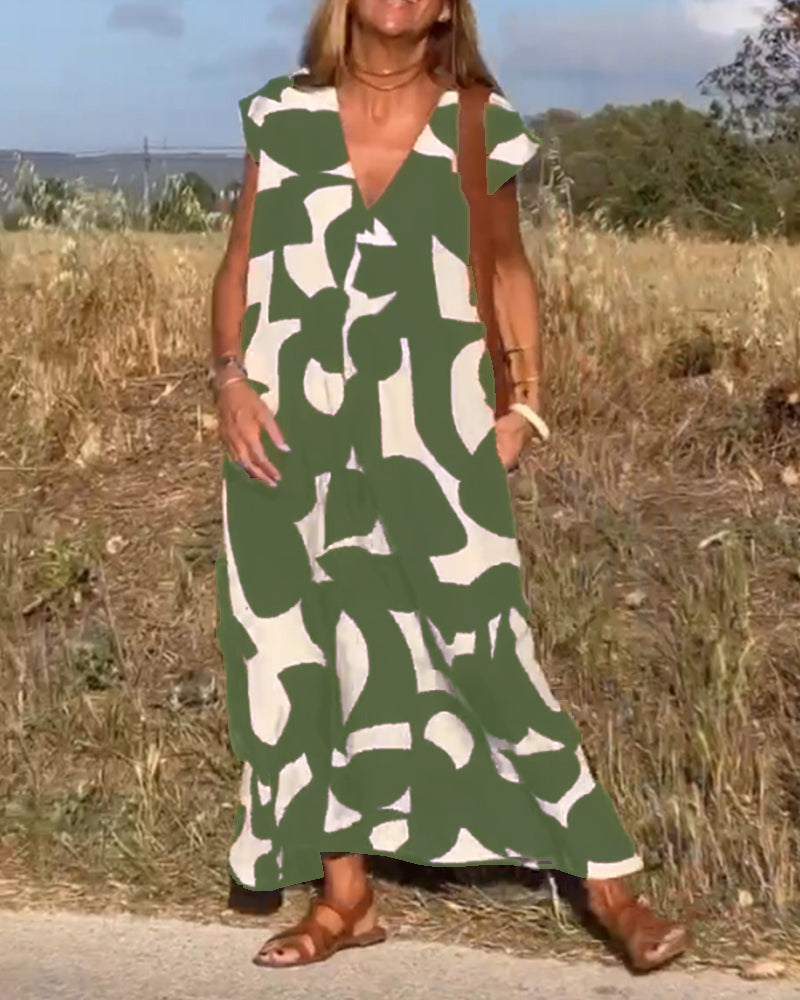Robe Camille imprimé élégant col V, vue de face, robe féminine tendance pour femmes, tissu doux et respirant.