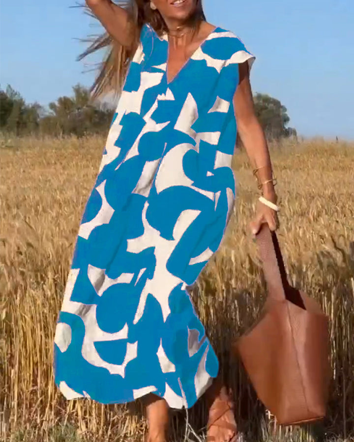 Robe Camille imprimé élégant col V, vue de face, robe féminine tendance pour femmes, tissu doux et respirant.