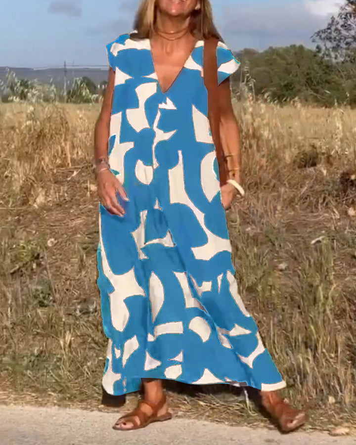 Robe Camille imprimé élégant col V, vue de face, robe féminine tendance pour femmes, tissu doux et respirant.