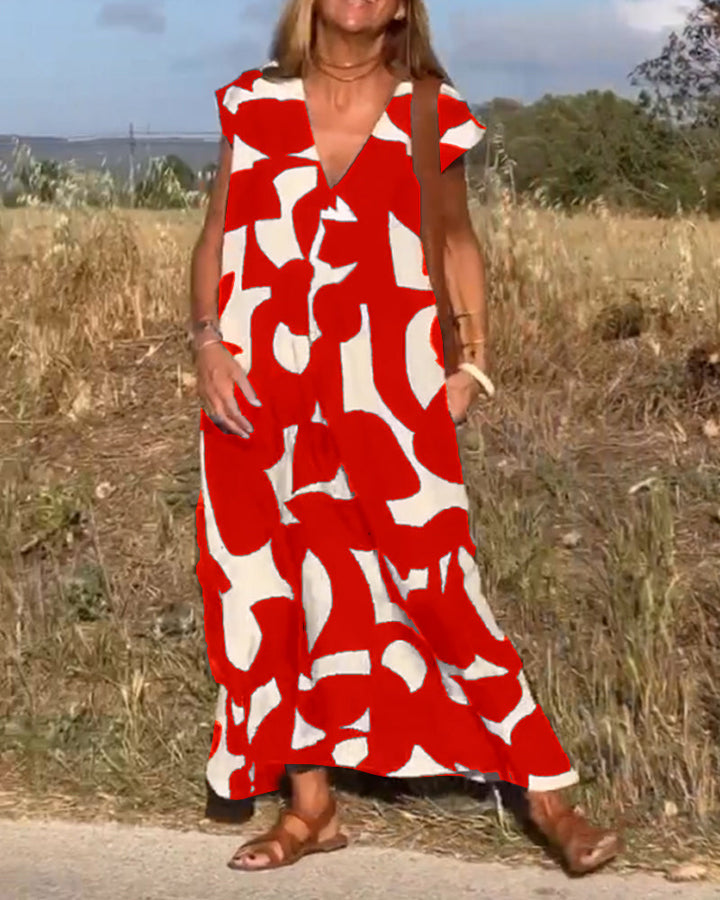 Robe Camille imprimé élégant col V, vue de face, robe féminine tendance pour femmes, tissu doux et respirant.