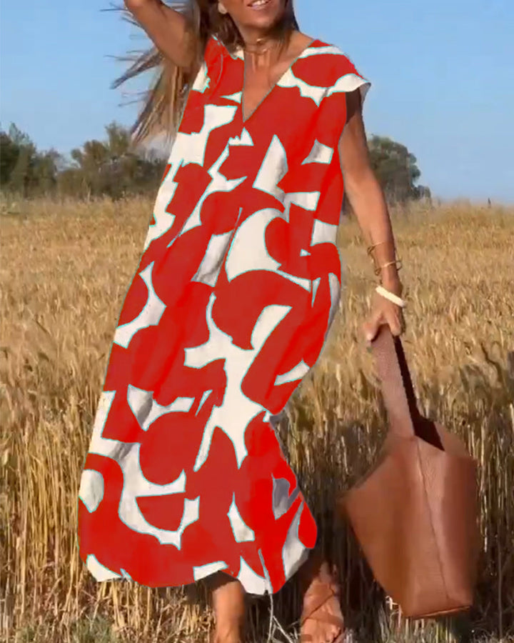 Robe Camille imprimé élégant col V, vue de face, robe féminine tendance pour femmes, tissu doux et respirant.