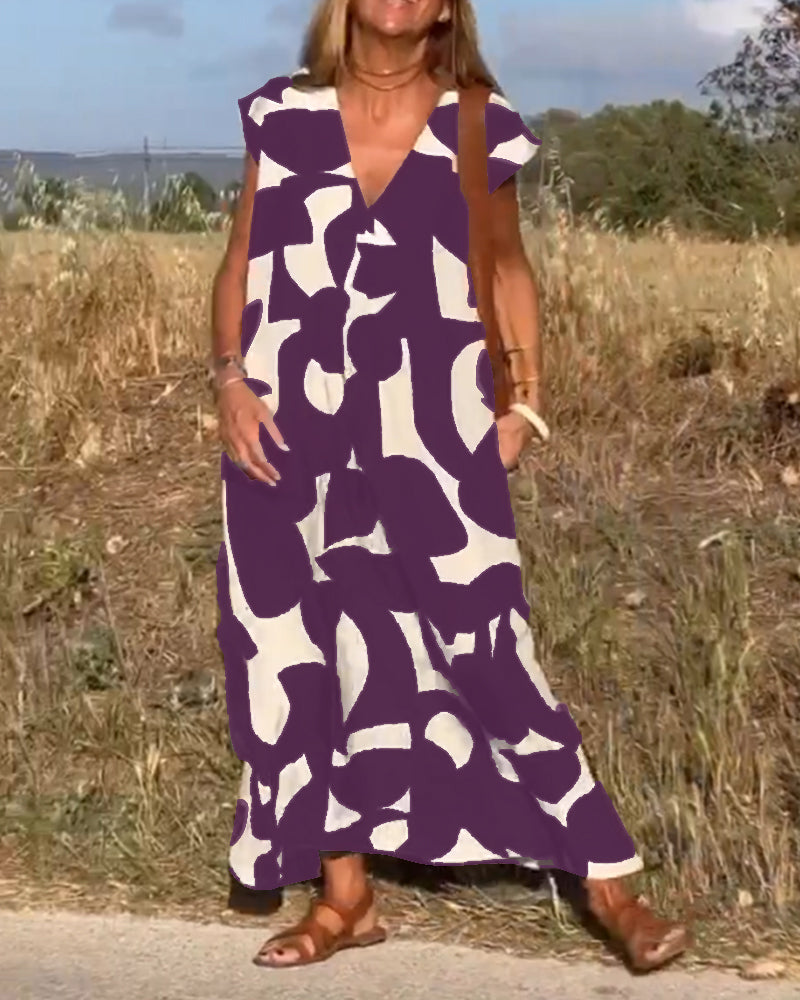 Robe Camille imprimé élégant col V, vue de face, robe féminine tendance pour femmes, tissu doux et respirant.