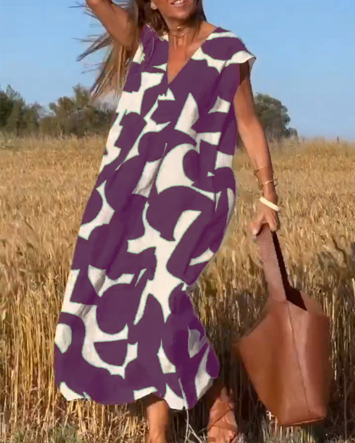 Robe Camille imprimé élégant col V, vue de face, robe féminine tendance pour femmes, tissu doux et respirant.