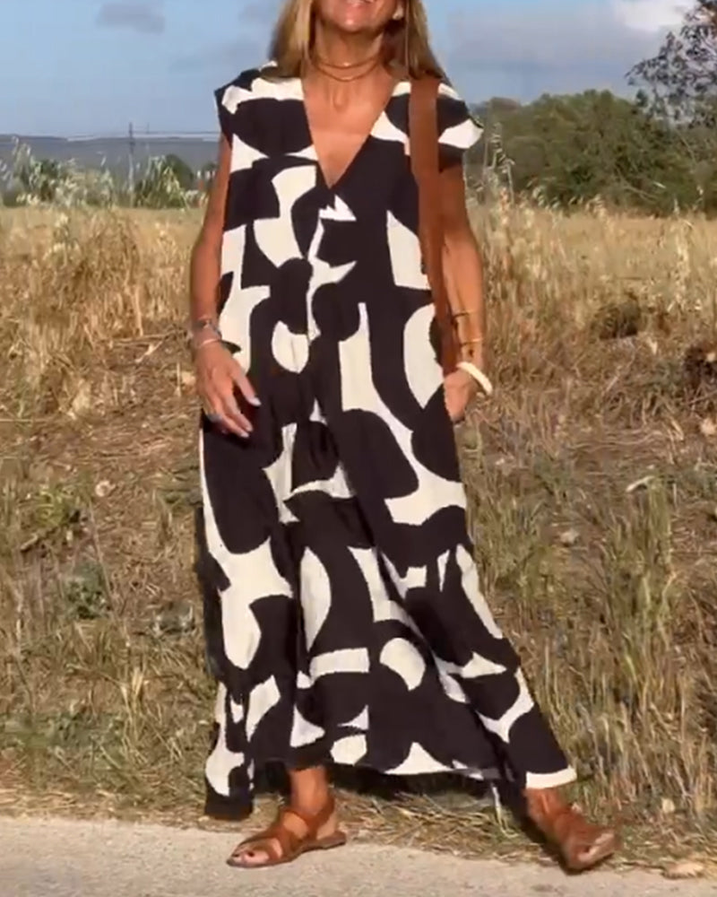 Robe Camille imprimé élégant col V, vue de face, robe féminine tendance pour femmes, tissu doux et respirant.
