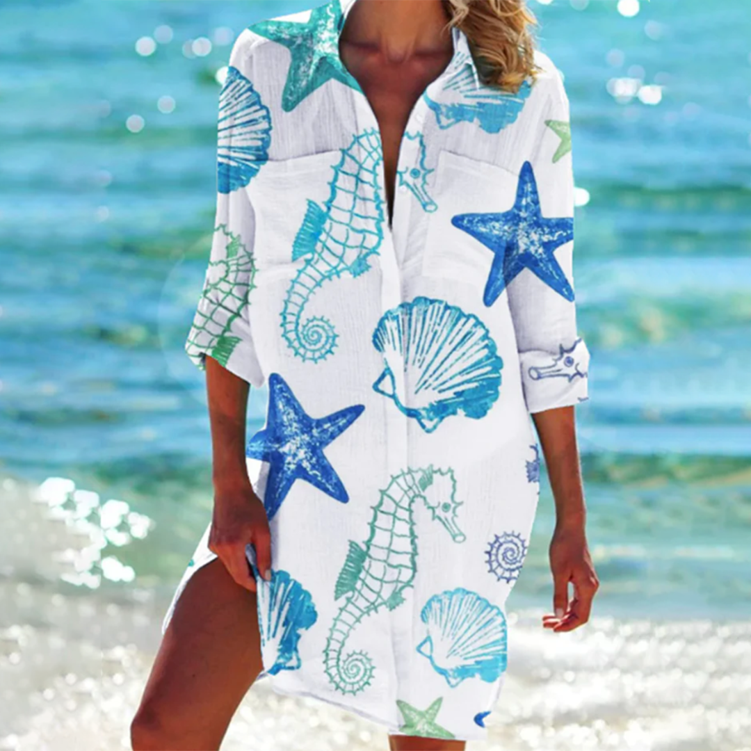 "Robe chemise Sophie élégante bleu corail, détails soignés, coupe flatteuse, parfait pour bureau ou sorties, confort optimal"