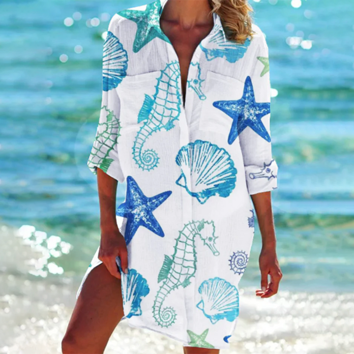 "Robe chemise Sophie élégante bleu corail, détails soignés, coupe flatteuse, parfait pour bureau ou sorties, confort optimal"