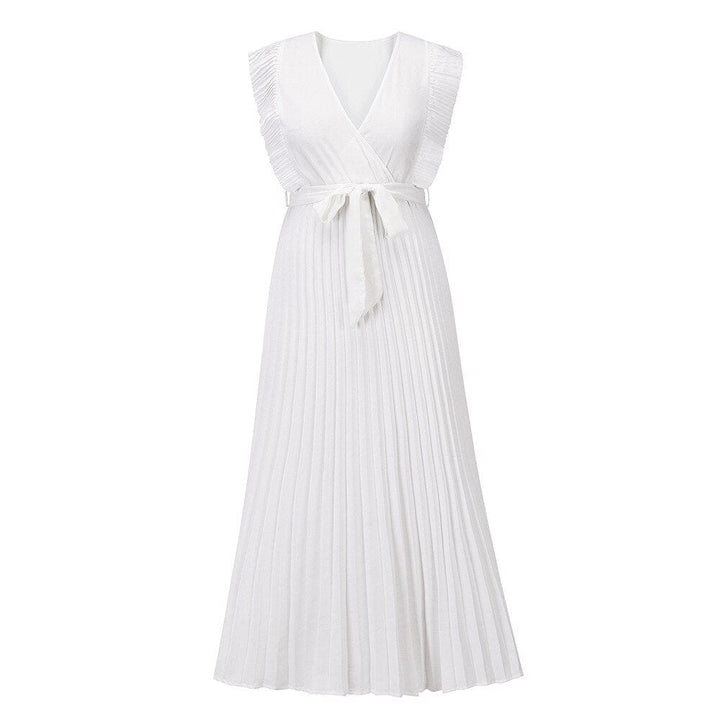 Robe de mariée bohème fluide à volants élégants, coupe maxi, détails raffinés et chic pour mariages et occasions uniques.