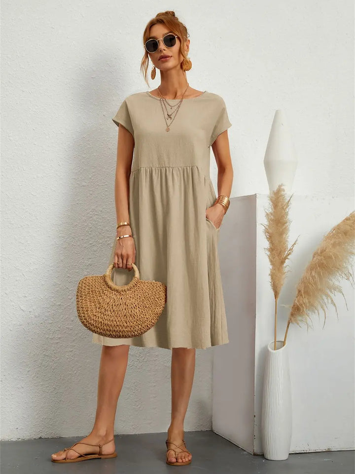 Robe décontractée femme avec poches, coupe ample, élégance quotidienne, style polyvalent.