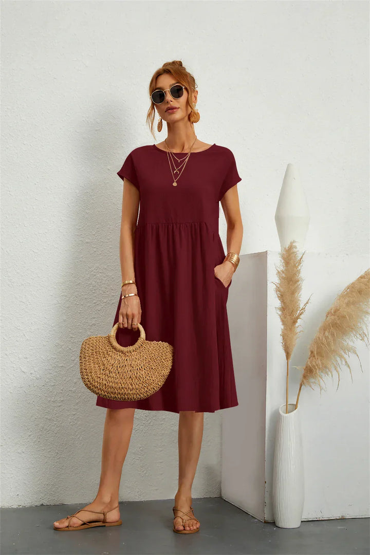 Robe décontractée femme avec poches, coupe ample, élégance quotidienne, style polyvalent.