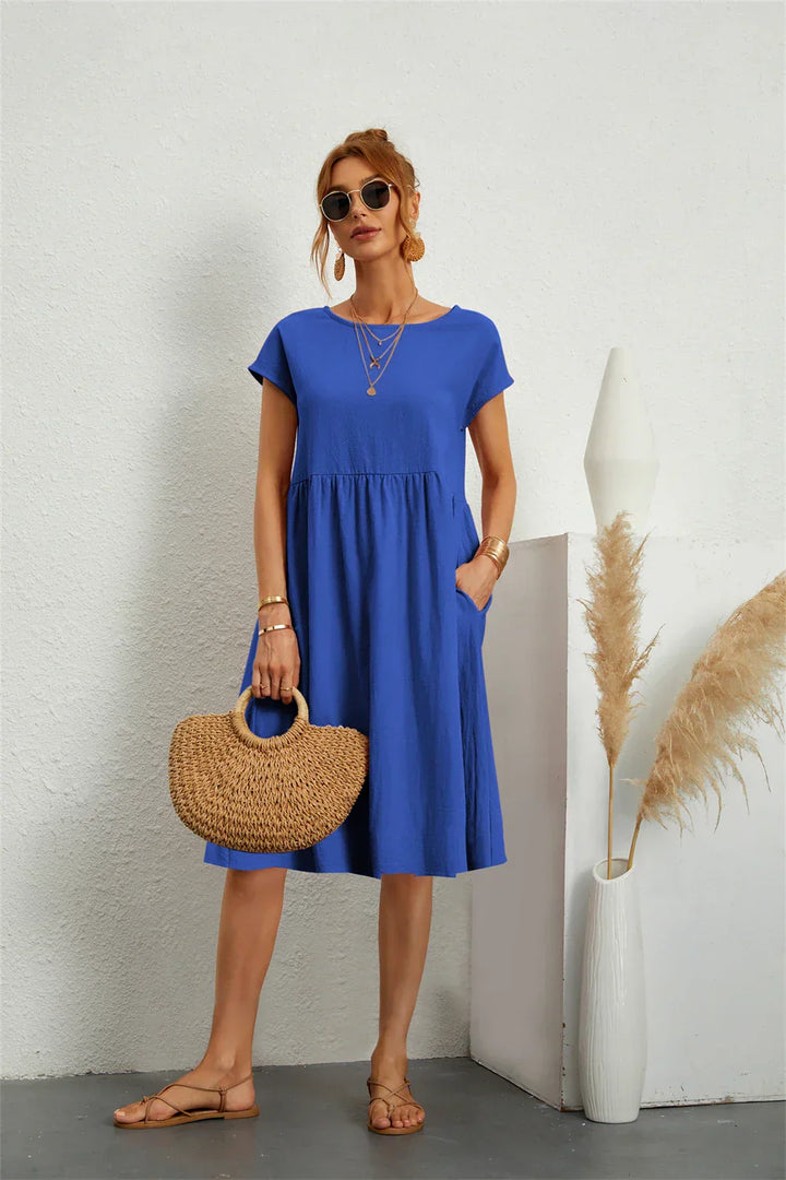 Robe décontractée femme avec poches, coupe ample, élégance quotidienne, style polyvalent.