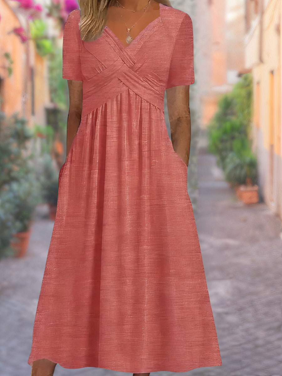Robe d'été élégante légère avec col en V, coupe ample, tissu respirant; idéale pour sorties estivales ensoleillées.