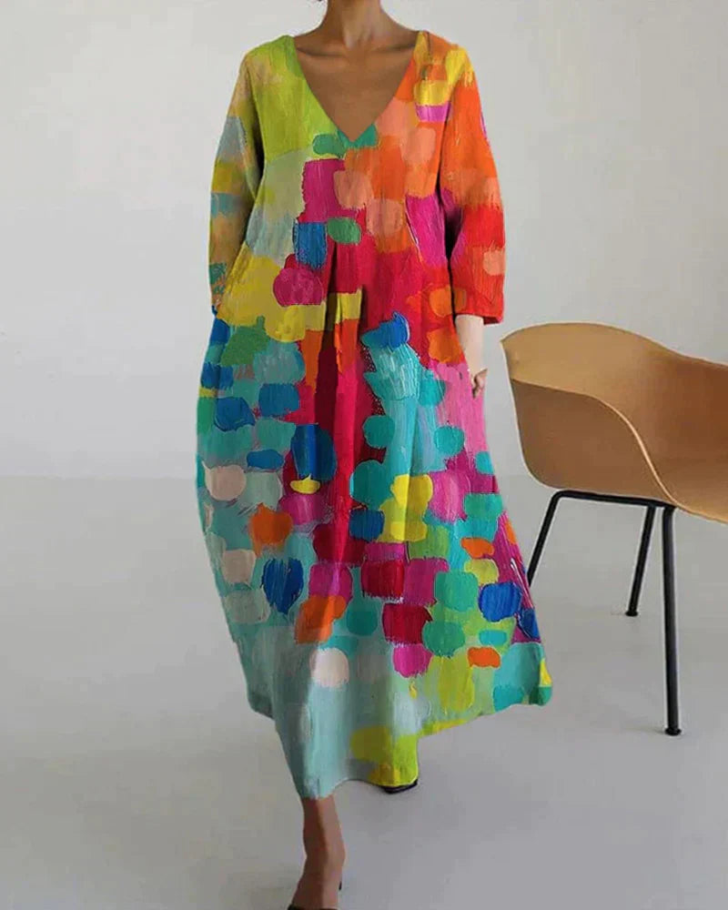 "Robe d'été en lin avec imprimé coloré, coupe flatteuse, idéale pour les sorties estivales."