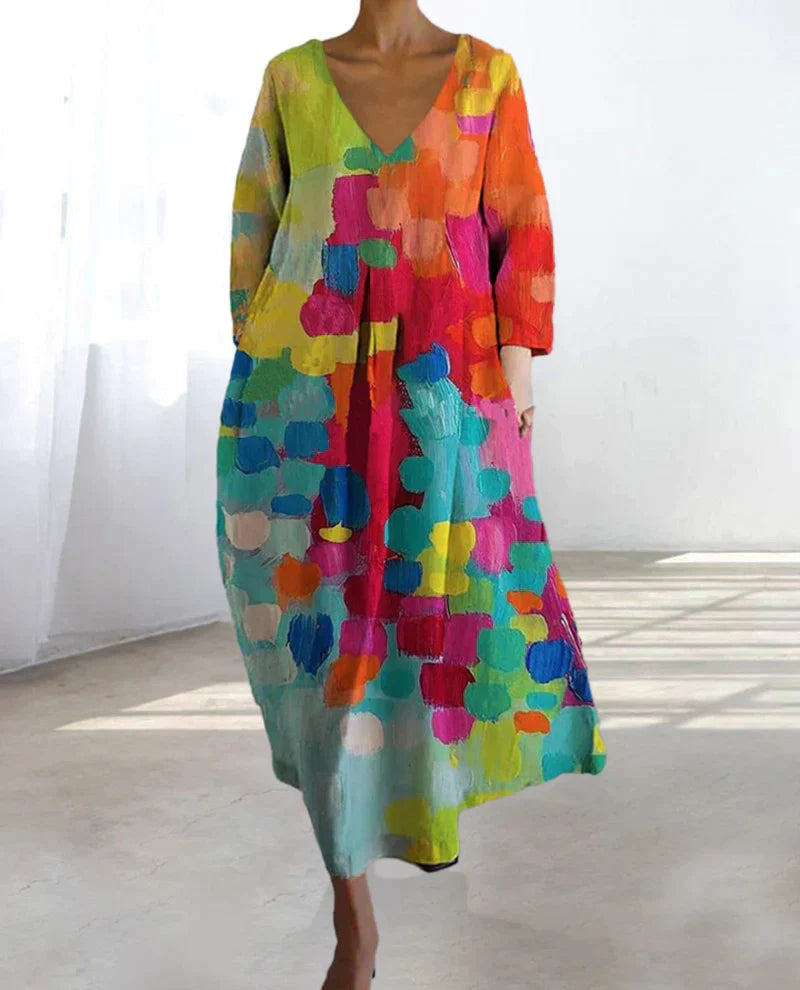 "Robe d'été en lin avec imprimé coloré, coupe flatteuse, idéale pour les sorties estivales."