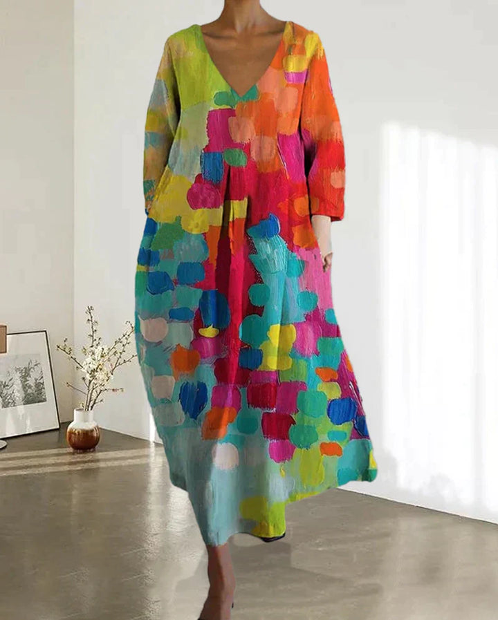 "Robe d'été en lin avec imprimé coloré, coupe flatteuse, idéale pour les sorties estivales."