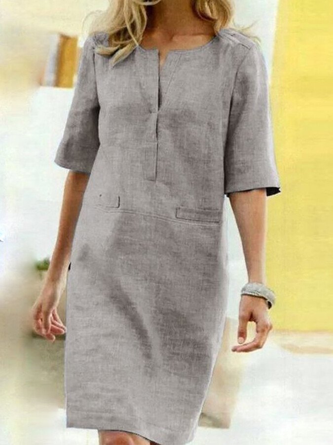 Robe d'été femme en coton et lin, design simple et élégant, couleur bleu ciel, idéale pour journées ensoleillées.