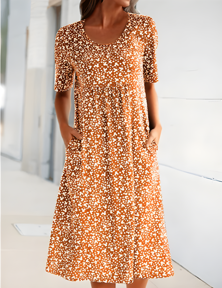 "Robe d'été légère Sophie, élégante avec tissu respirant, design moderne, idéale pour sorties estivales décontractées."