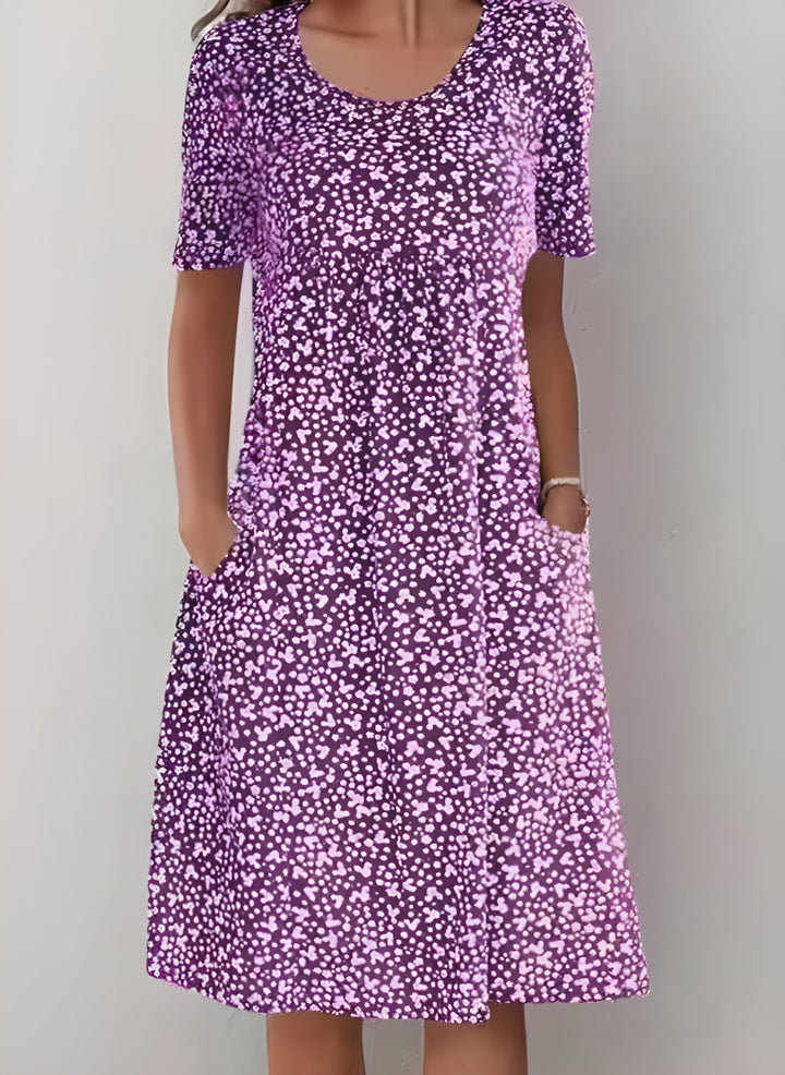 "Robe d'été légère Sophie, élégante avec tissu respirant, design moderne, idéale pour sorties estivales décontractées."