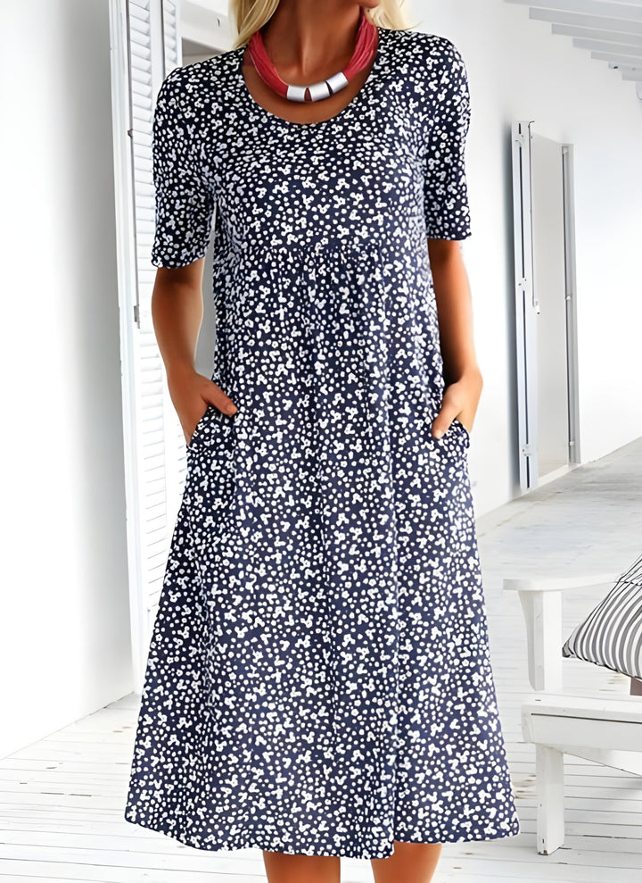 "Robe d'été légère Sophie, élégante avec tissu respirant, design moderne, idéale pour sorties estivales décontractées."
