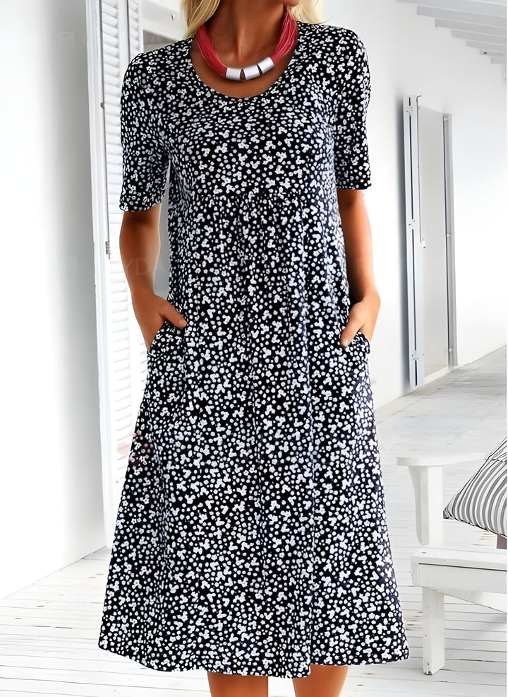 "Robe d'été légère Sophie, élégante avec tissu respirant, design moderne, idéale pour sorties estivales décontractées."