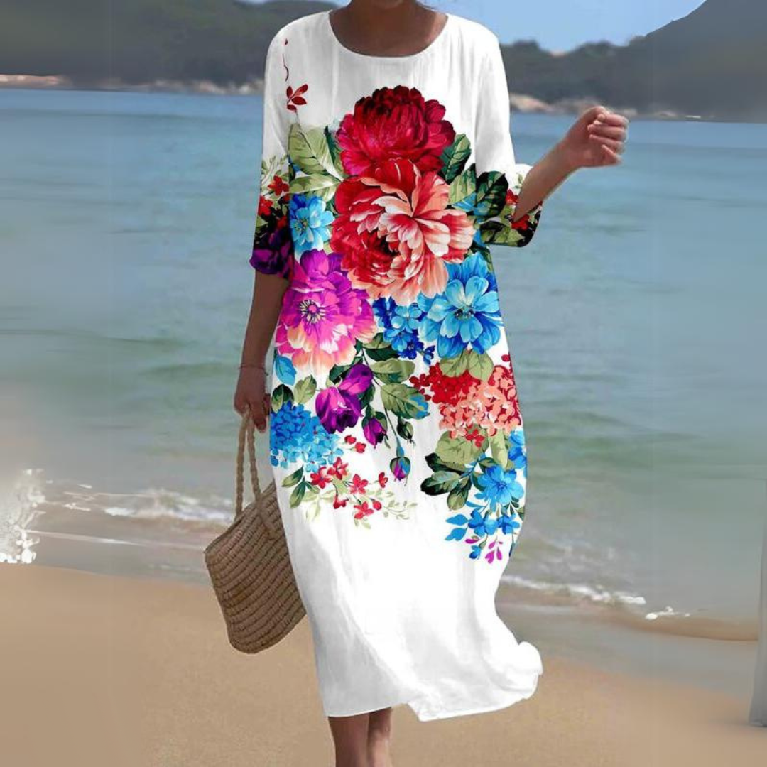 "Robe d'été midi fluide et élégante, idéale pour journées ensoleillées, en tissu léger offrant confort et style décontracté."