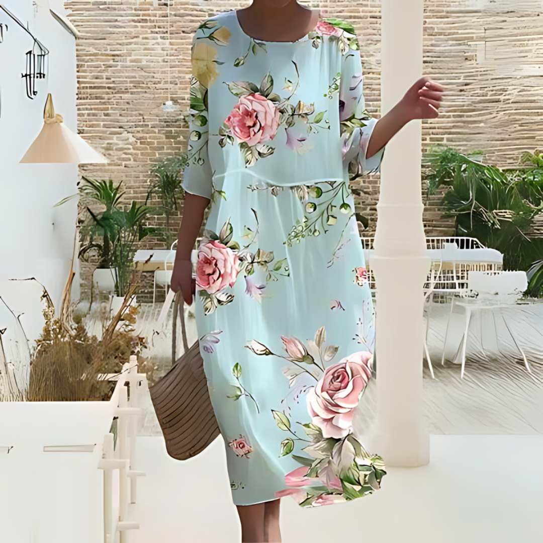"Robe d'été midi fluide et élégante, idéale pour journées ensoleillées, en tissu léger offrant confort et style décontracté."