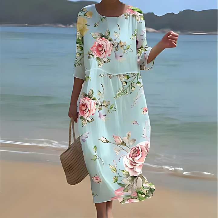 "Robe d'été midi fluide et élégante, idéale pour journées ensoleillées, en tissu léger offrant confort et style décontracté."