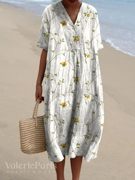 "Robe d'été Odile en coton-lin, motifs floraux, coupe élégante et confortable, idéale pour vos journées estivales."