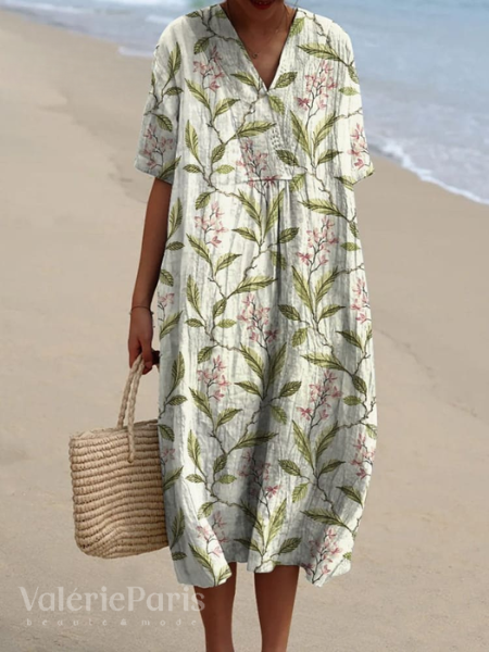 "Robe d'été Odile en coton-lin, motifs floraux, coupe élégante et confortable, idéale pour vos journées estivales."