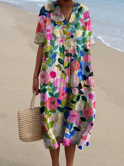 "Robe d'été Odile en coton-lin, motifs floraux, coupe élégante et confortable, idéale pour vos journées estivales."