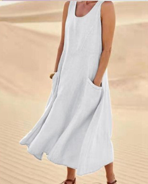 Robe élégante en coton beige, poches spacieuses, coupe fluide, idéale pour confort quotidien et élégance décontractée.