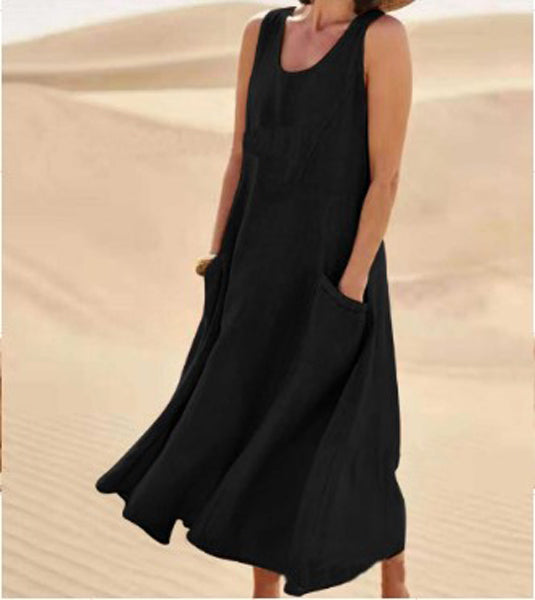 Robe élégante en coton beige, poches spacieuses, coupe fluide, idéale pour confort quotidien et élégance décontractée.