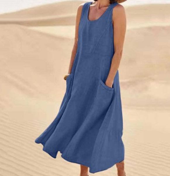 Robe élégante en coton beige, poches spacieuses, coupe fluide, idéale pour confort quotidien et élégance décontractée.