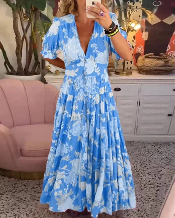 "Robe élégante Juliette flottante en tissu léger, encolure en V, cintrée à la taille, idéale pour toutes occasions."
