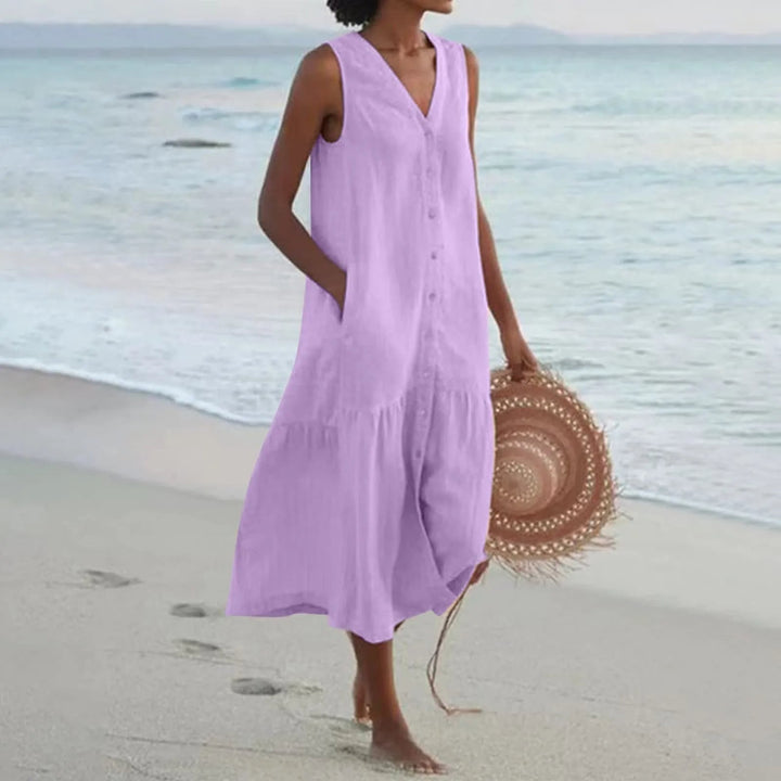 Robe en lin légère avec col en V flatteur, coupe élégante, idéale pour l'été. Parfaite pour toutes les occasions.