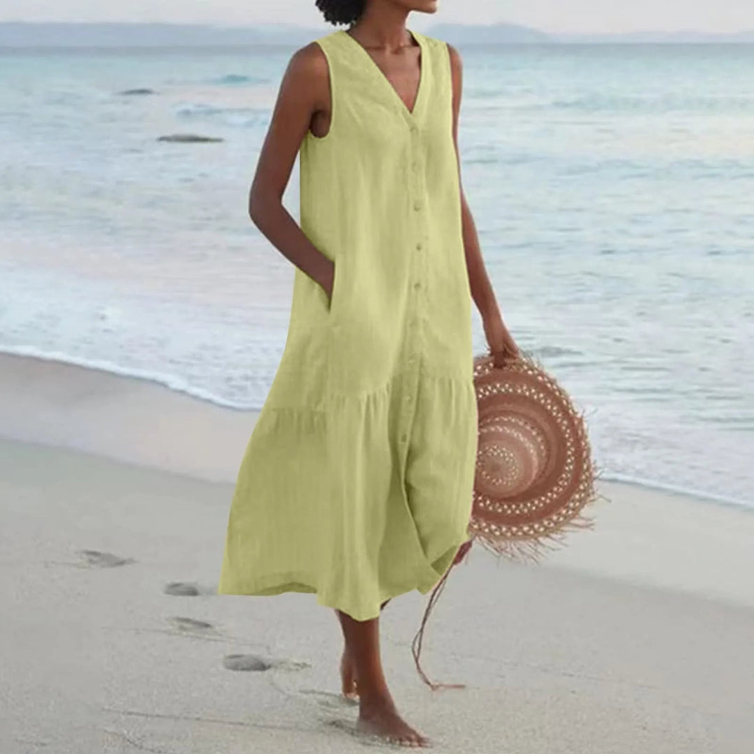 Robe en lin légère avec col en V flatteur, coupe élégante, idéale pour l'été. Parfaite pour toutes les occasions.