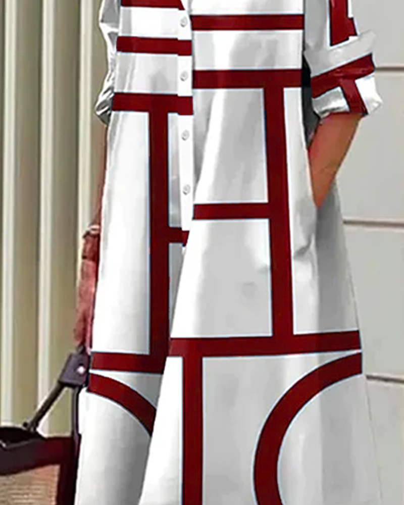 "Robe Estelle avec imprimé géométrique et poches latérales, élégante et moderne, vue d'ensemble."