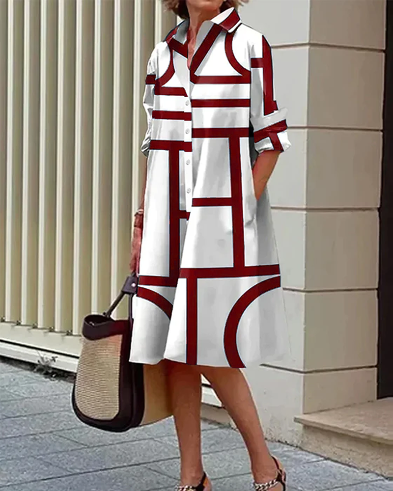 "Robe Estelle avec imprimé géométrique et poches latérales, élégante et moderne, vue d'ensemble."
