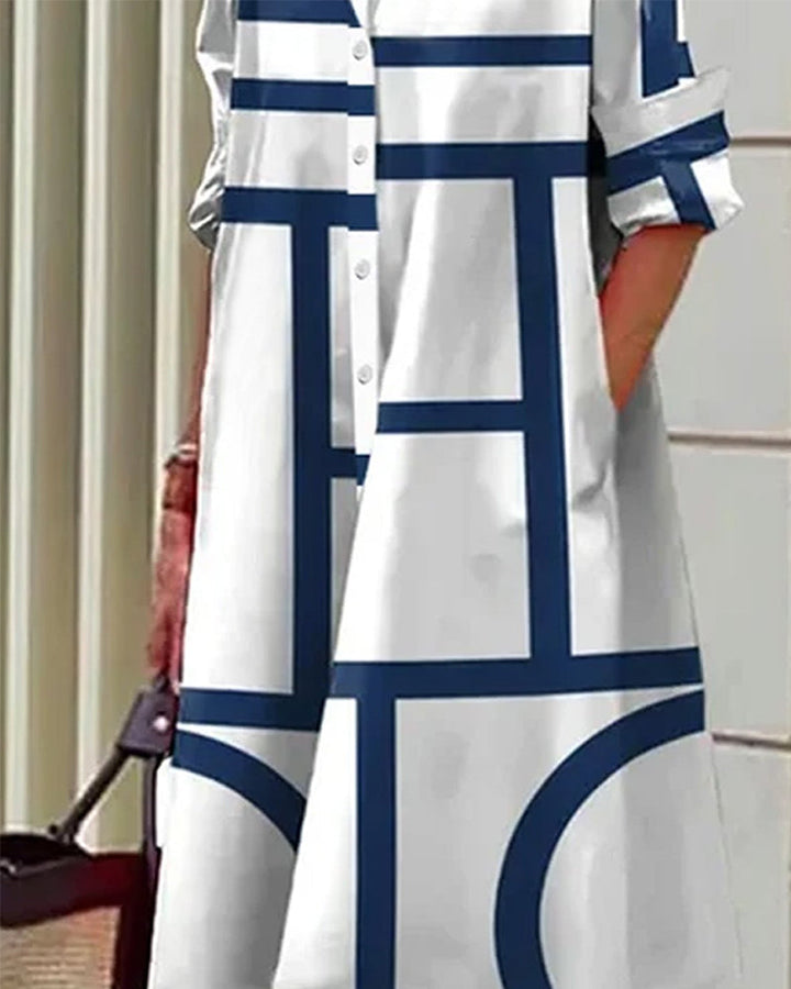 "Robe Estelle avec imprimé géométrique et poches latérales, élégante et moderne, vue d'ensemble."