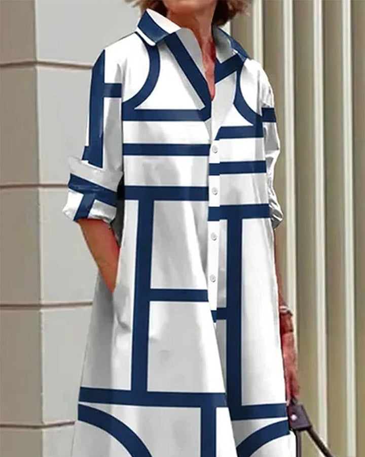 "Robe Estelle avec imprimé géométrique et poches latérales, élégante et moderne, vue d'ensemble."