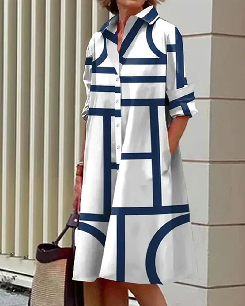 "Robe Estelle avec imprimé géométrique et poches latérales, élégante et moderne, vue d'ensemble."