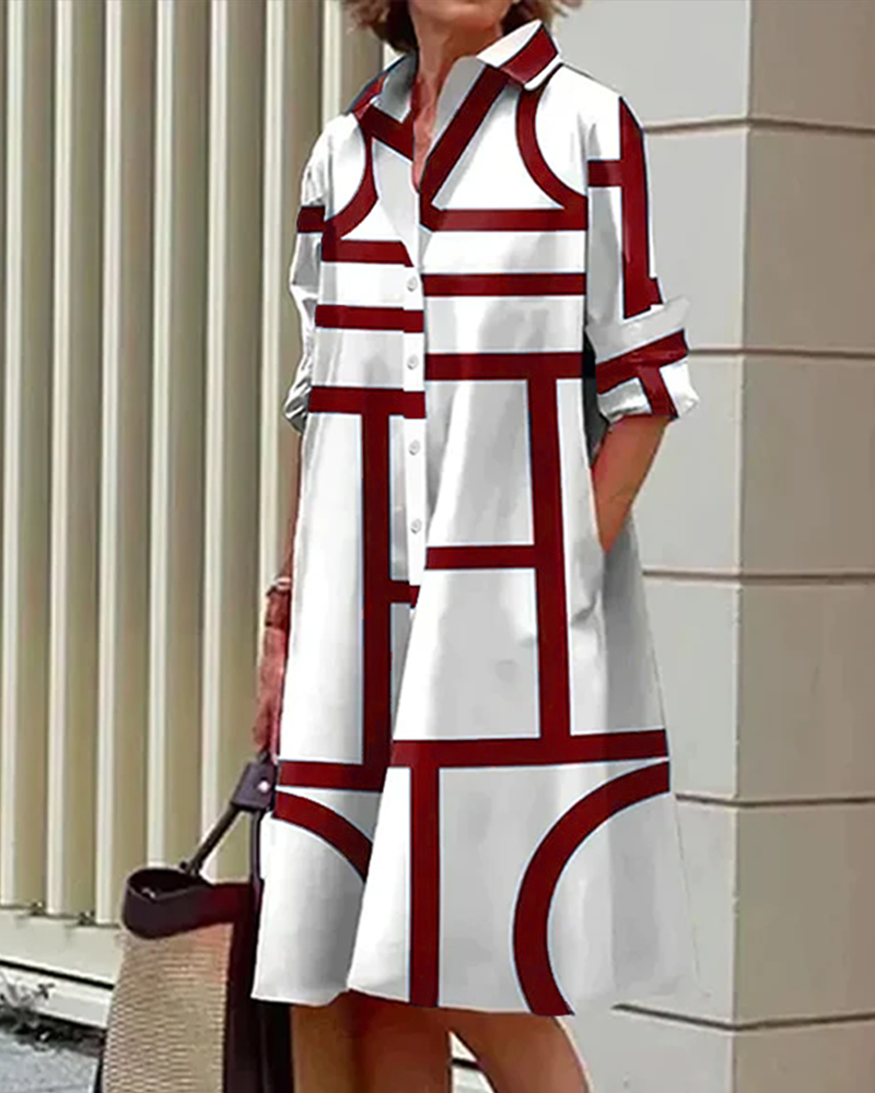 "Robe Estelle avec imprimé géométrique et poches latérales, élégante et moderne, vue d'ensemble."