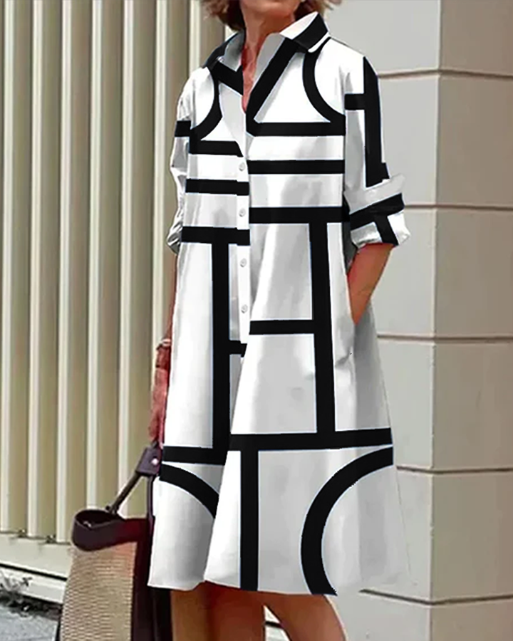 "Robe Estelle avec imprimé géométrique et poches latérales, élégante et moderne, vue d'ensemble."