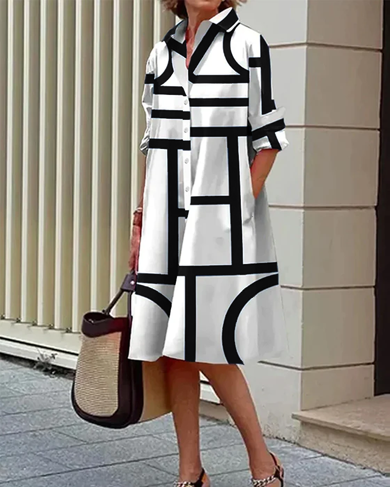 "Robe Estelle avec imprimé géométrique et poches latérales, élégante et moderne, vue d'ensemble."