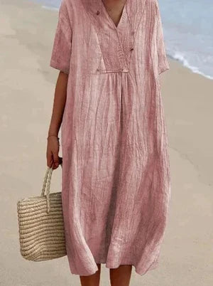 "Robe estivale en lin et coton, coupe ample et décontractée, idéale pour les journées chaudes, style vacances décontracté."