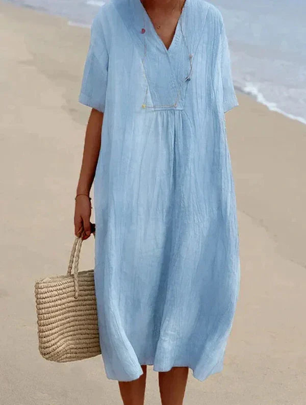 "Robe estivale en lin et coton, coupe ample et décontractée, idéale pour les journées chaudes, style vacances décontracté."