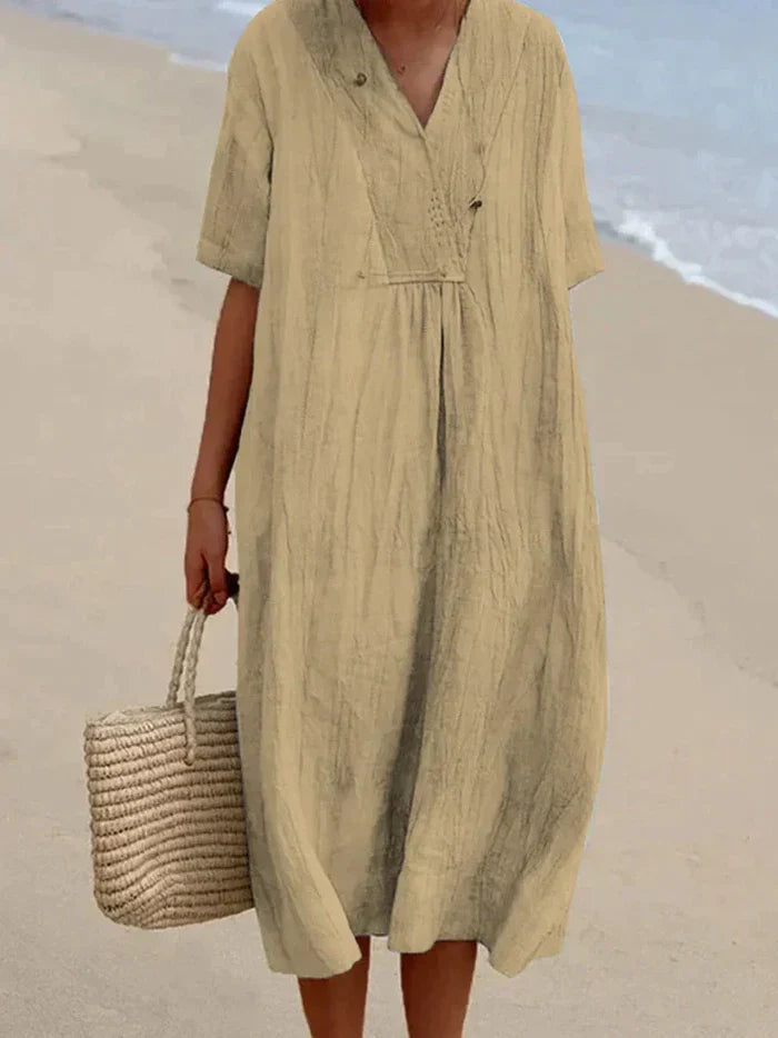 "Robe estivale en lin et coton, coupe ample et décontractée, idéale pour les journées chaudes, style vacances décontracté."