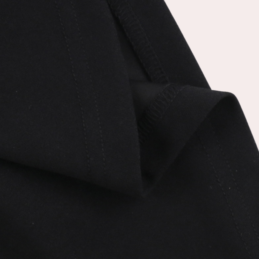 "Robe été élégante femme JANELLE noire, design sophistiqué, coupe flatteuse pour événement formel ou décontracté."