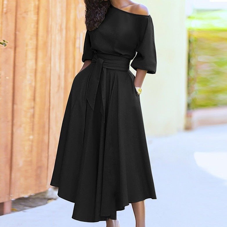 Robe femme en coton, taille cintrée, couleur unie, style classique et élégant pour toutes occasions.