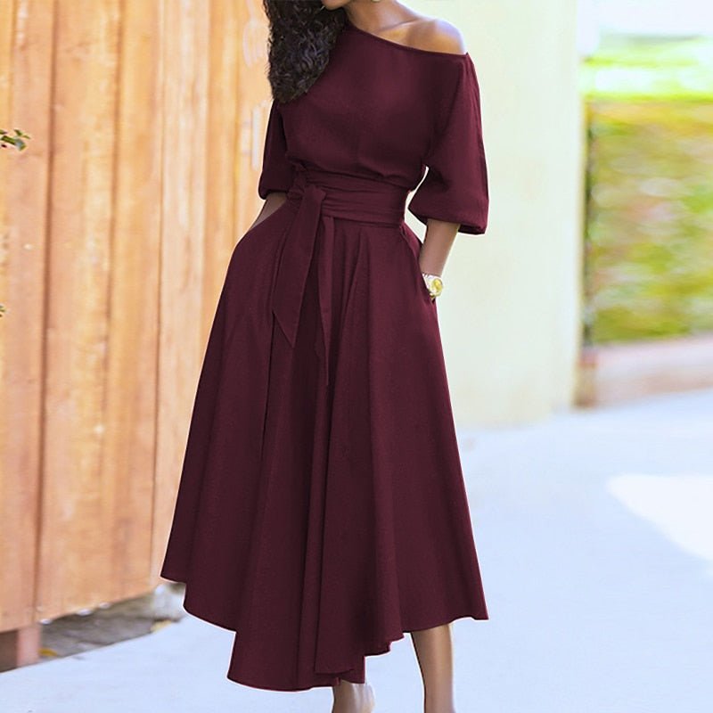 Robe femme en coton, taille cintrée, couleur unie, style classique et élégant pour toutes occasions.